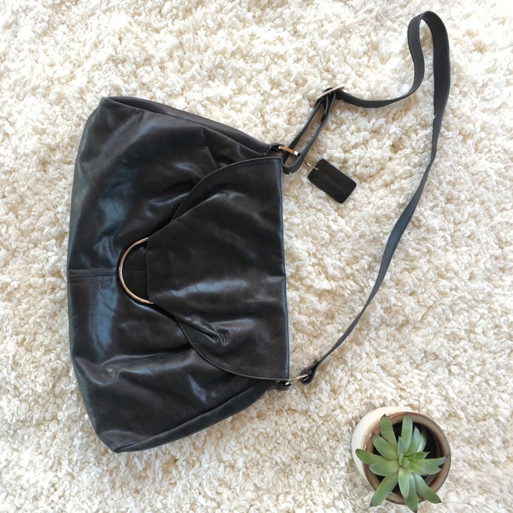 Iris Tyler black genuine leather crossbody.